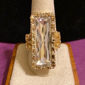 Gorgeous large faux rectangle diamond and ornate gold tone statement ring